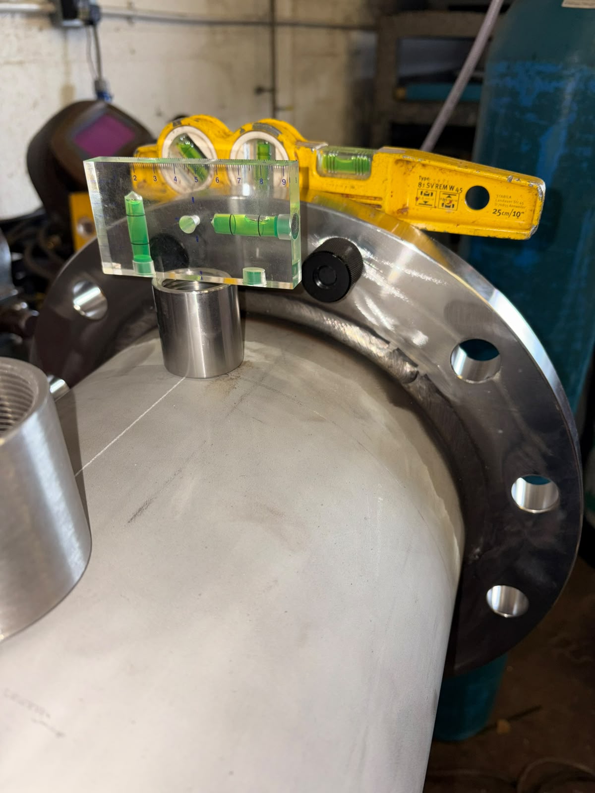 Bespoke stainless-steel vessel flange fabrication on the workshop bench